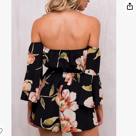 NWOT. Black flowy floral off the shoulder 3/4 sleeve romper. - Picture 5 of 11